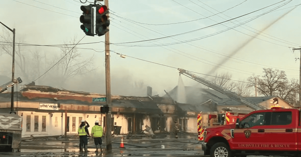 strip mall fire being put out.