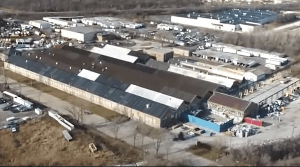 Image: manufacturing facility prior to being burned down