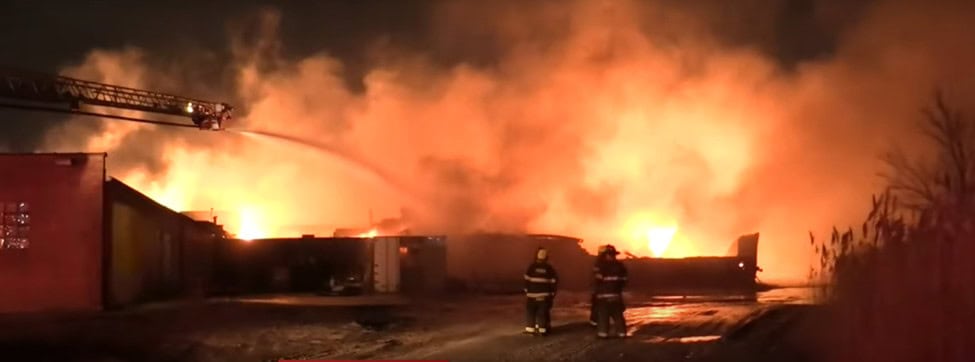 Fire crew extinguishing the fire from above